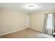 Neutral bedroom with a large window with curtains at 8380 Kolven Dr, Avon, IN 46123