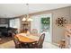 Dining room with view to living room and sliding glass door to the backyard at 8380 Kolven Dr, Avon, IN 46123