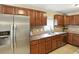 Kitchen with stainless steel appliances, granite countertops and backsplash, and plenty of cabinet space at 8380 Kolven Dr, Avon, IN 46123