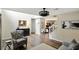 Spacious living room featuring hardwood floors and an open staircase at 8380 Kolven Dr, Avon, IN 46123