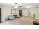 Cozy loft area with two armchairs, a small table, and a stylish floor lamp at 8380 Kolven Dr, Avon, IN 46123