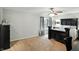 Primary bedroom with a dark wood bed frame, and a ceiling fan at 8380 Kolven Dr, Avon, IN 46123