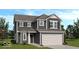 Charming two-story home with gray siding and a two-car garage at 8662 Hollander Dr, Camby, IN 46113
