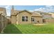 Exterior rear view showing a backyard with a grill at 958 Denton Ct, Westfield, IN 46074