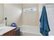 This bathroom offers a tub and shower combination, plus the convenience of a fan at 958 Denton Ct, Westfield, IN 46074