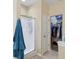 The bathroom includes a glass-enclosed shower and a doorway leading to a well-organized closet at 958 Denton Ct, Westfield, IN 46074