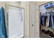Bathroom with glass shower doors and an organized walk-in closet at 958 Denton Ct, Westfield, IN 46074
