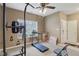 Exercise room with a pull-up bar, treadmill, and natural light at 958 Denton Ct, Westfield, IN 46074