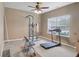 Home gym with a ceiling fan, natural light, and workout equipment at 958 Denton Ct, Westfield, IN 46074