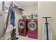 Functional laundry room with a washer, dryer, and storage shelves at 958 Denton Ct, Westfield, IN 46074