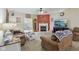 Cozy living room with a fireplace, comfortable seating, and an open floor plan at 958 Denton Ct, Westfield, IN 46074