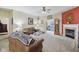 Inviting living room with comfortable seating, a fireplace, and an open view to other areas at 958 Denton Ct, Westfield, IN 46074
