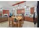Eat in kitchen flows into the living room and features a fireplace with a cozy seating area at 958 Denton Ct, Westfield, IN 46074
