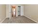 Bedroom with neutral paint and carpet features an open doorway, allowing natural light to flow at 10548 Magenta Dr, Noblesville, IN 46060