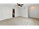 Bedroom featuring a ceiling fan, neutral-toned walls, and an adjoining bathroom providing convenience at 10548 Magenta Dr, Noblesville, IN 46060