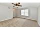 Bright bedroom with neutral walls, soft carpeting, a ceiling fan, and a window letting in natural light at 10548 Magenta Dr, Noblesville, IN 46060