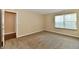 Bright carpeted bedroom with neutral walls and an open doorway at 10548 Magenta Dr, Noblesville, IN 46060