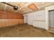 Attached garage with ample storage cabinets and wall-mounted features, providing organized space at 10548 Magenta Dr, Noblesville, IN 46060
