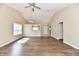 Spacious living room boasts hardwood floors, modern lighting, and neutral wall paint at 10548 Magenta Dr, Noblesville, IN 46060