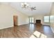 Inviting living room featuring hardwood floors, fireplace, and ample natural light at 10548 Magenta Dr, Noblesville, IN 46060