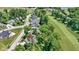 Beautiful aerial view of a home on a golf course, surrounded by lush greenery and mature trees at 10585 Golden Bear Way, Noblesville, IN 46060
