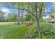 This backyard is complete with mature trees, professional landscaping and an expansive lawn at 10585 Golden Bear Way, Noblesville, IN 46060