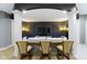 Entertain in style at this in home bar with stone accents, seating and a TV at 10585 Golden Bear Way, Noblesville, IN 46060