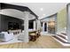 Open concept basement features a bar area, entertainment area, and luxury finishes throughout at 10585 Golden Bear Way, Noblesville, IN 46060