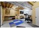 Finished basement featuring an exercise area, work space and drop ceiling at 10585 Golden Bear Way, Noblesville, IN 46060