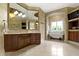 Elegant bathroom featuring a clawfoot tub, a walk-in shower, and a spacious vanity at 10585 Golden Bear Way, Noblesville, IN 46060