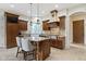Gourmet kitchen with stainless appliances, granite countertops, and a stylish center island at 10585 Golden Bear Way, Noblesville, IN 46060