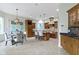 Spacious kitchen featuring a large island, stainless steel appliances, and custom cabinetry at 10585 Golden Bear Way, Noblesville, IN 46060