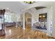 Bright and airy living space with hardwood floors, custom trim, and abundant natural light at 10585 Golden Bear Way, Noblesville, IN 46060