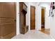 Functional mudroom with a built-in bench, storage cabinets, and easy access to the home's interior at 10585 Golden Bear Way, Noblesville, IN 46060