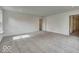 Bright, airy bedroom with neutral carpet and an en suite bathroom at 1073 E Valley Oak Ct, Mooresville, IN 46158