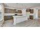 Modern kitchen featuring sleek countertops, stainless steel appliances, and stylish cabinetry at 1073 E Valley Oak Ct, Mooresville, IN 46158