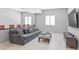 Basement with lounge area and a mounted television at 10795 Creekbed Cir, Fishers, IN 46038
