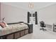Bedroom with a built in storage bed and a dedicated desk area at 10795 Creekbed Cir, Fishers, IN 46038