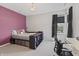 Bedroom with a built in storage bed and a dedicated desk area at 10795 Creekbed Cir, Fishers, IN 46038