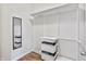 Walk-in closet with installed shelving and organizers at 10795 Creekbed Cir, Fishers, IN 46038
