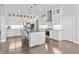 Gorgeous open kitchen with custom cabinets, stainless steel appliances, and spacious island at 10795 Creekbed Cir, Fishers, IN 46038