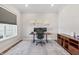 Home office features a sleek desk, ergonomic chair, and modern decor at 10795 Creekbed Cir, Fishers, IN 46038