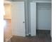 Bedroom closet with white doors and shelving provides ample storage space at 1155 E Perry St, Indianapolis, IN 46227