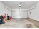 Spacious two-car garage with an automatic door and ample storage space at 1158 Thistlewood Way, Plainfield, IN 46168