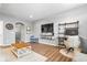 Cozy living space with modern shelving, TV setup, and comfortable seating area at 1158 Thistlewood Way, Plainfield, IN 46168