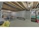 Unfinished basement area with concrete walls and floor, and a ping pong table at 1202 Vestman Ct, Greenwood, IN 46143
