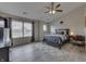 Bedroom featuring a comfortable bed with gray bedding, and a large window at 1202 Vestman Ct, Greenwood, IN 46143
