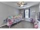 Bedroom with a bed, window, and ceiling fan at 1202 Vestman Ct, Greenwood, IN 46143