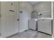 Bright laundry room with a white washer and dryer at 1202 Vestman Ct, Greenwood, IN 46143