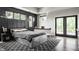 Spacious bedroom with unique bed design, natural light, and a dedicated workspace with desk and chair at 12022 Otto Ln, Carmel, IN 46032